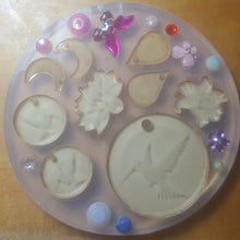 Load image into Gallery viewer, Etched Hummingbirds, Lotus Flower, Lily Flower, with Moons, and Butterflies Crystal Clear Platinum Silicone Mold