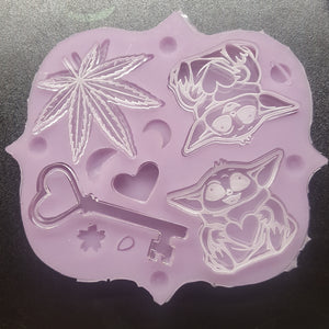 Etched Little Green Baby Aliens, Heart Key, and Pot Leaf Mold Made with Crystal Clear Platinum Silicone