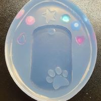 Load image into Gallery viewer, Dog Tag Paw Mold made with Crystal Clear Platinum Silicone