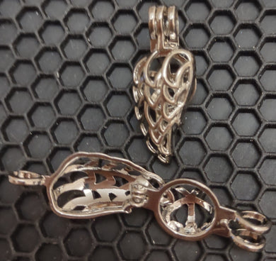 Hollow Wing Feather Cage Pendant will hold a 9mm bead (Please read description)