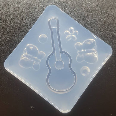 Guitar Shaker Mold made with Crystal Clear Platinum Silicone
