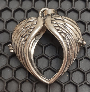Angel Wings Cage Pendant will hold a 14 to 16mm bead (Please read description)